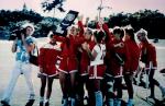 Women's soccer team raising trophy earned at the 1989 NCAA Division II championship